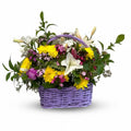 Sunshine Basket colorful fresh flowers with yellow blooms and white lilies – Blue Flowers Egypt